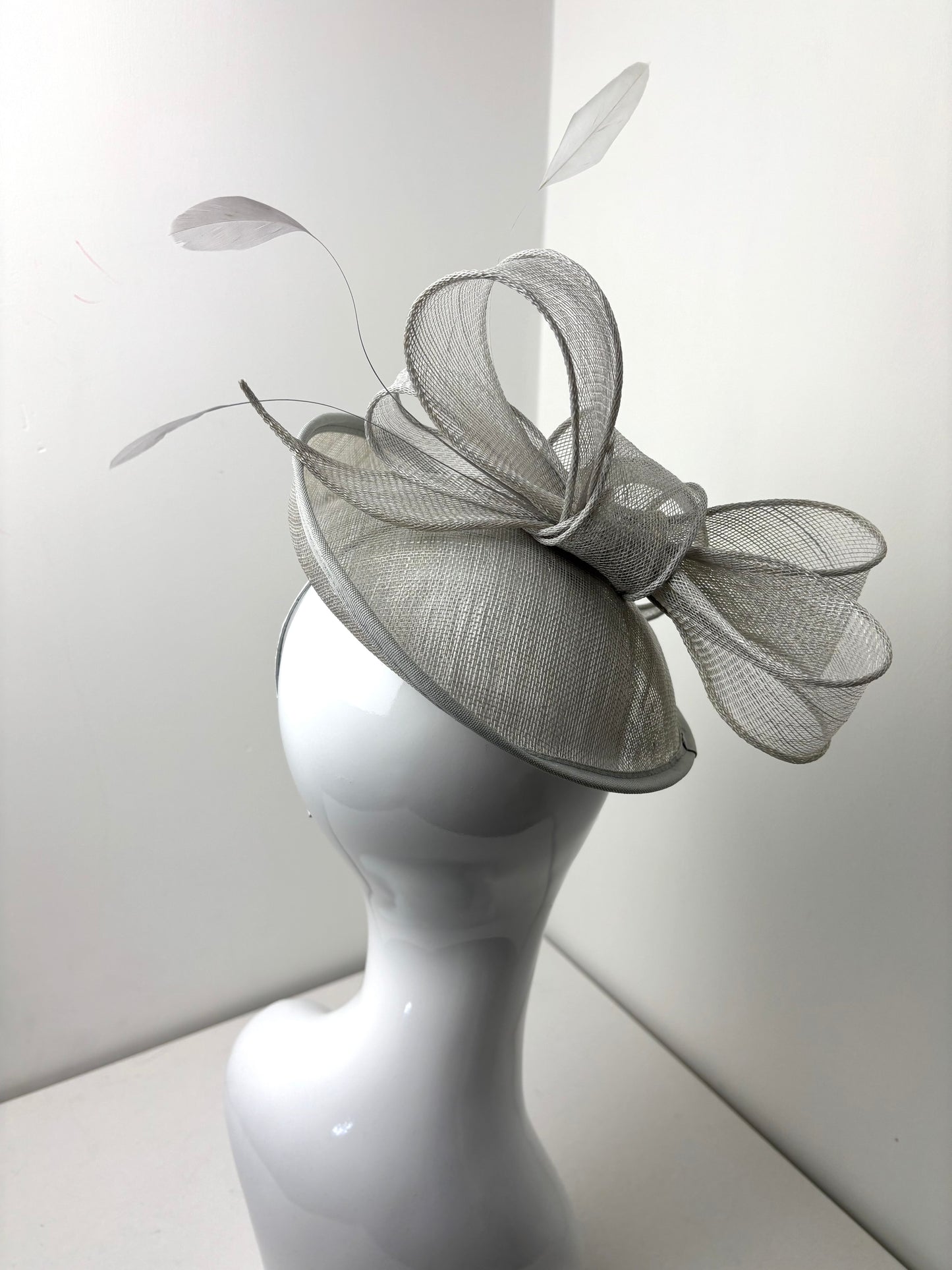 Bespoke Elegant Grey Sinamay Fascinator with Sculpted Bow & Feathers