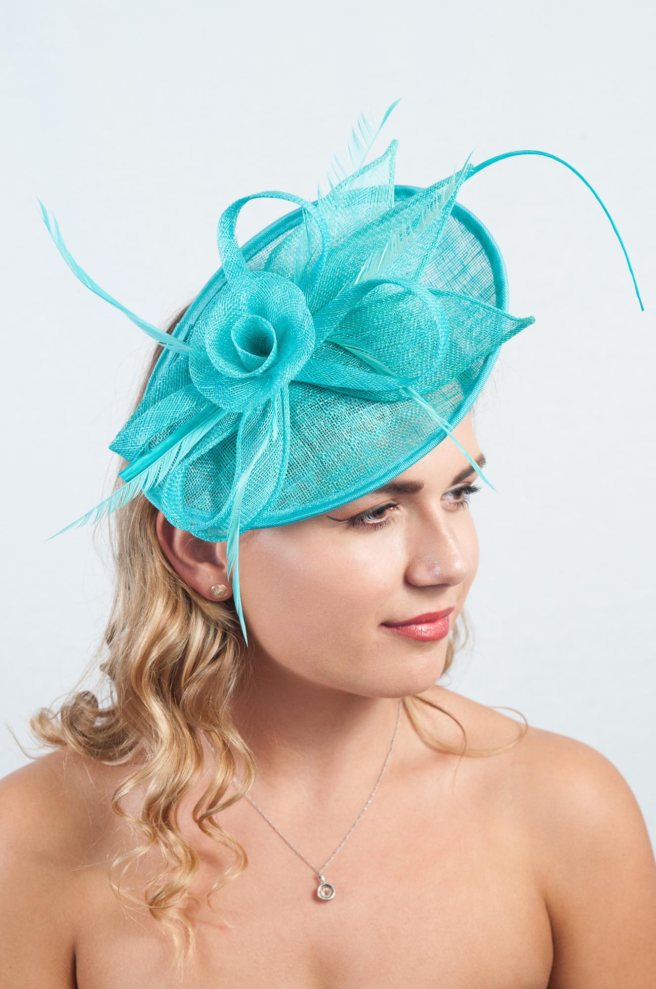 Turquoise Oval Floral Quill Fascinator