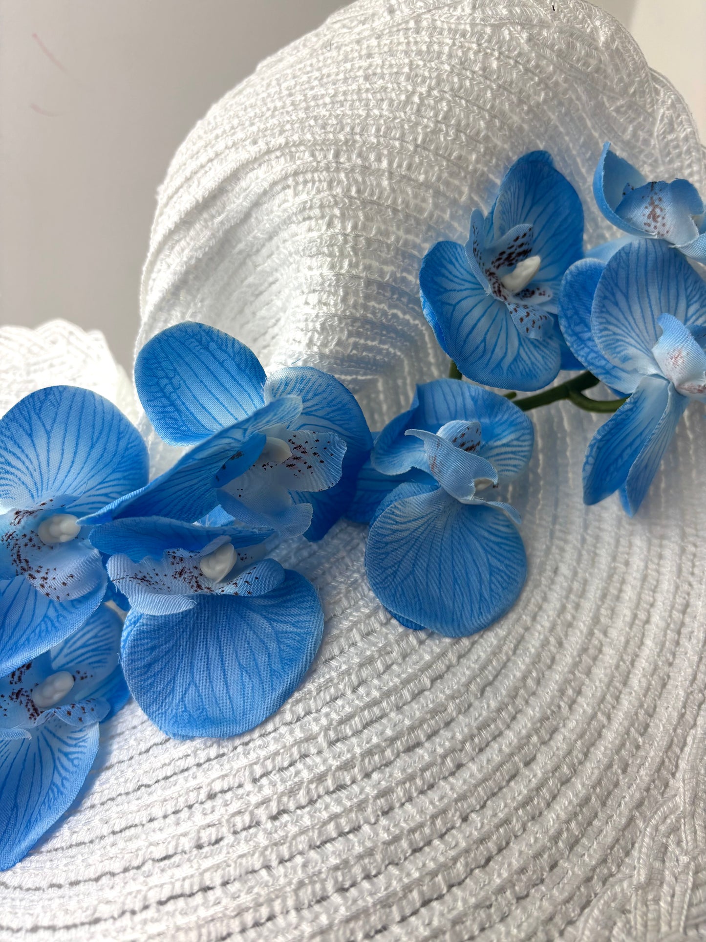 Bespoke Blue and White Orchid Fascinator