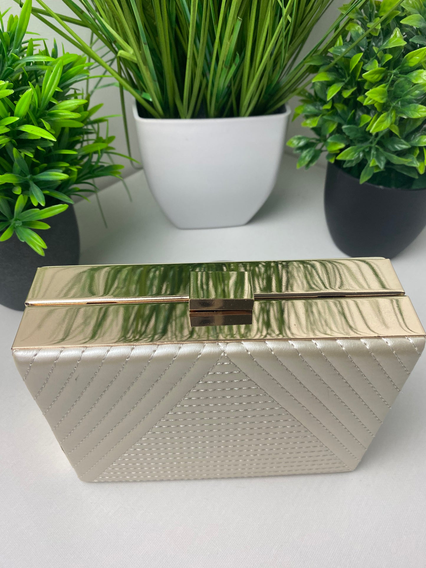 Champagne Arrowstitch Clutch Bag