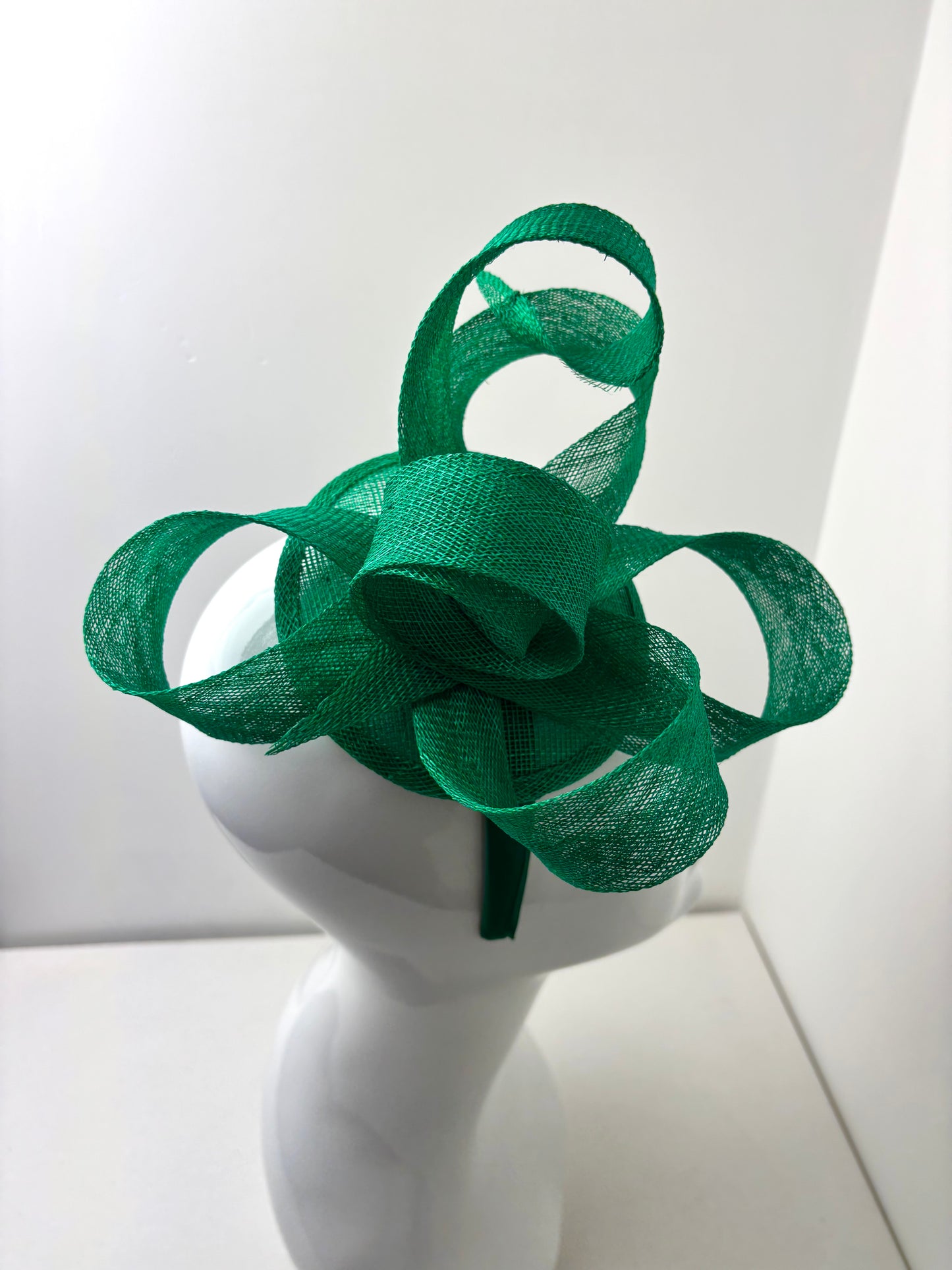 Bespoke Emerald Green Sculptural Sinamay Headpiece on Satin Headband