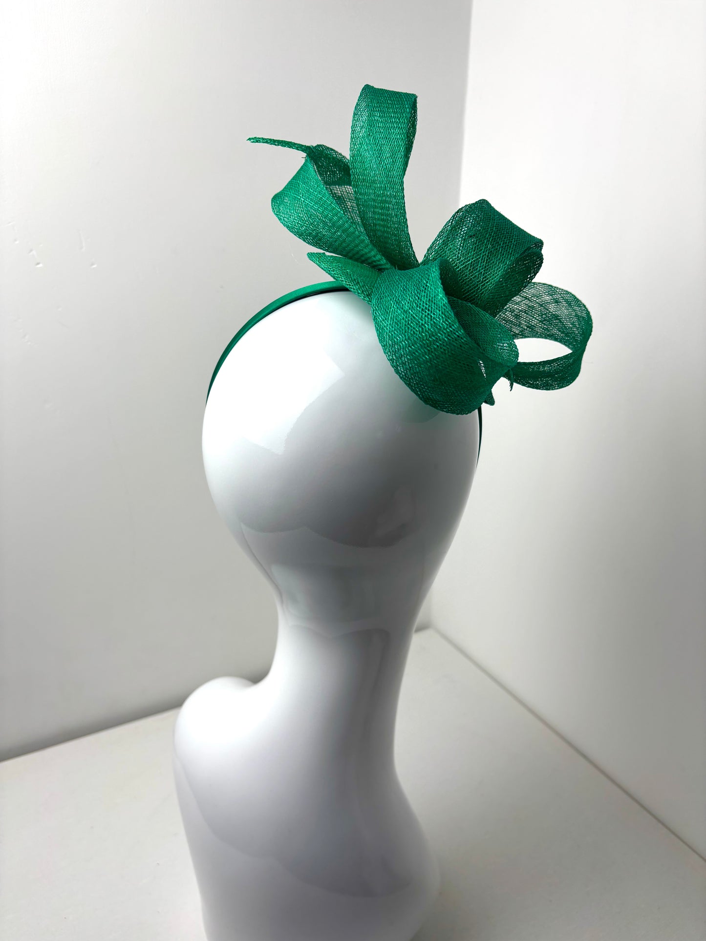 Bespoke Emerald Green Sculptural Sinamay Headpiece on Satin Headband