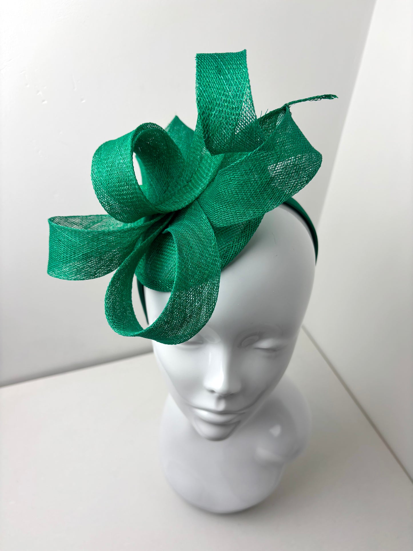 Bespoke Emerald Green Sculptural Sinamay Headpiece on Satin Headband