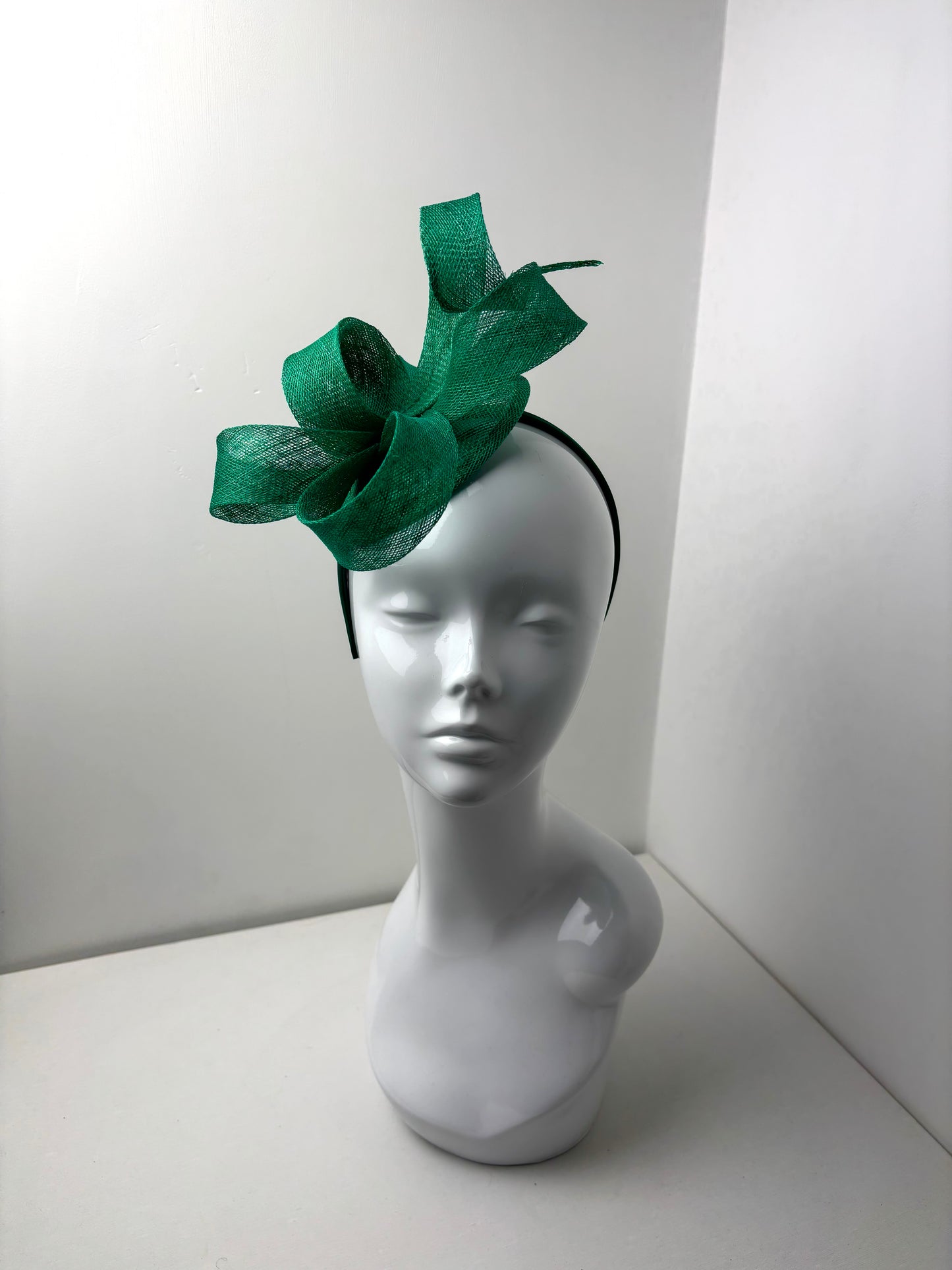 Bespoke Emerald Green Sculptural Sinamay Headpiece on Satin Headband