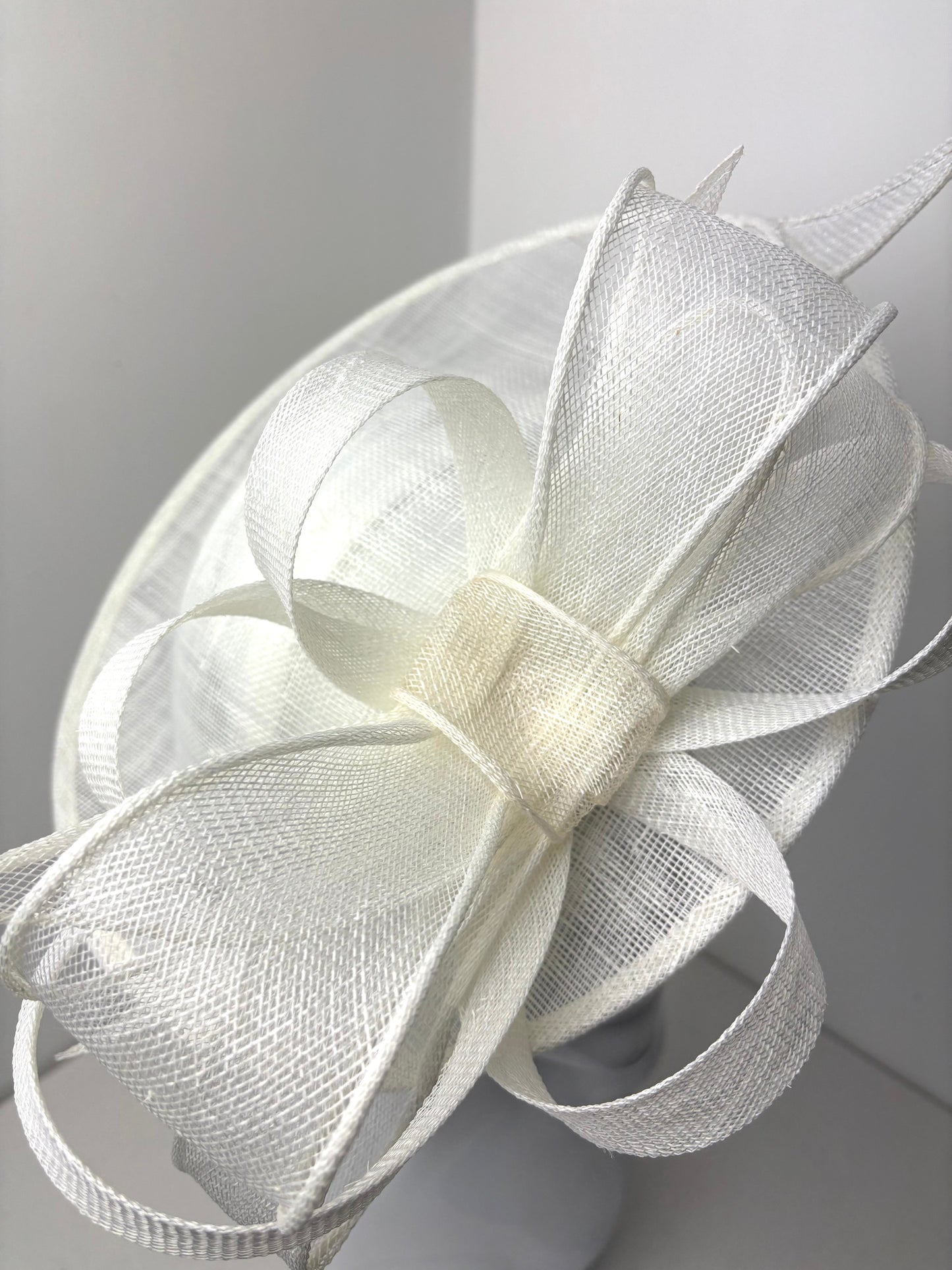 Bespoke Northumbrian White Loop Bow Sinamay Hatinator