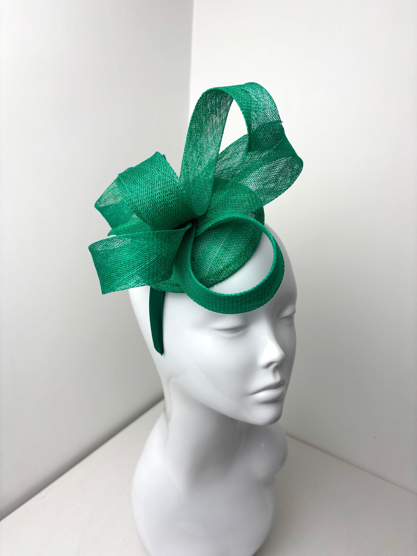 Bespoke Emerald Green Sculptural Sinamay Headpiece on Satin Headband