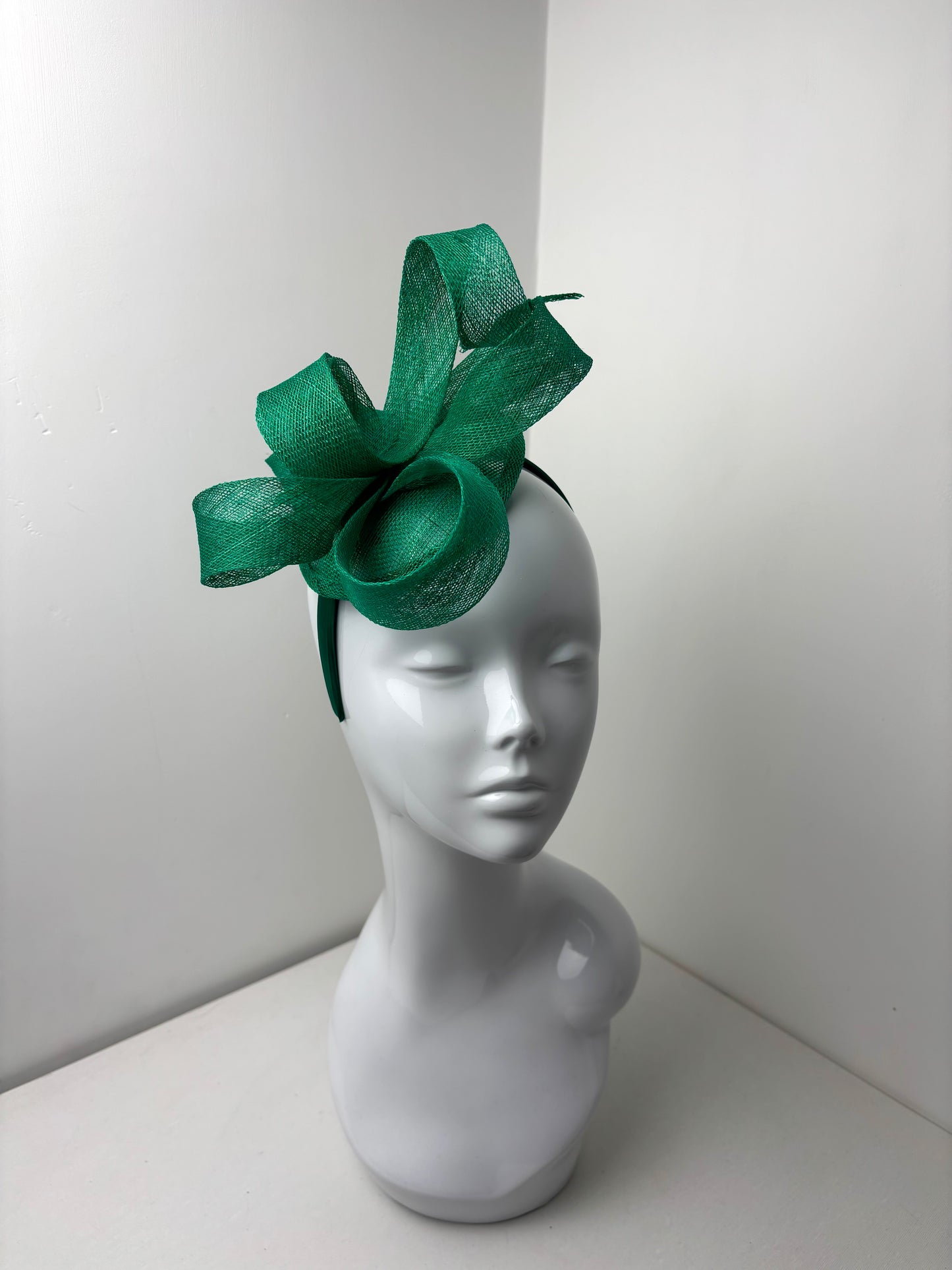 Bespoke Emerald Green Sculptural Sinamay Headpiece on Satin Headband